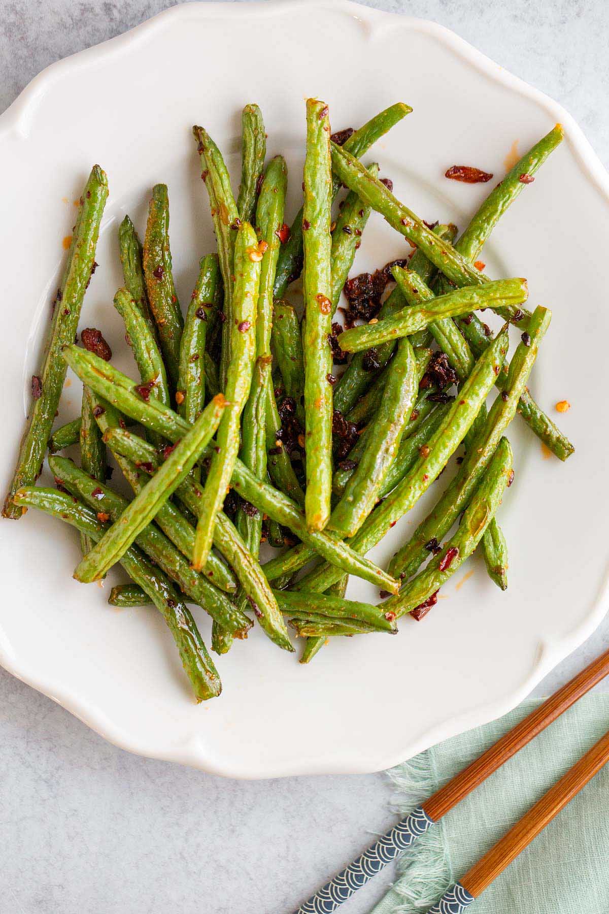 Chili crisp green beans on a plate.