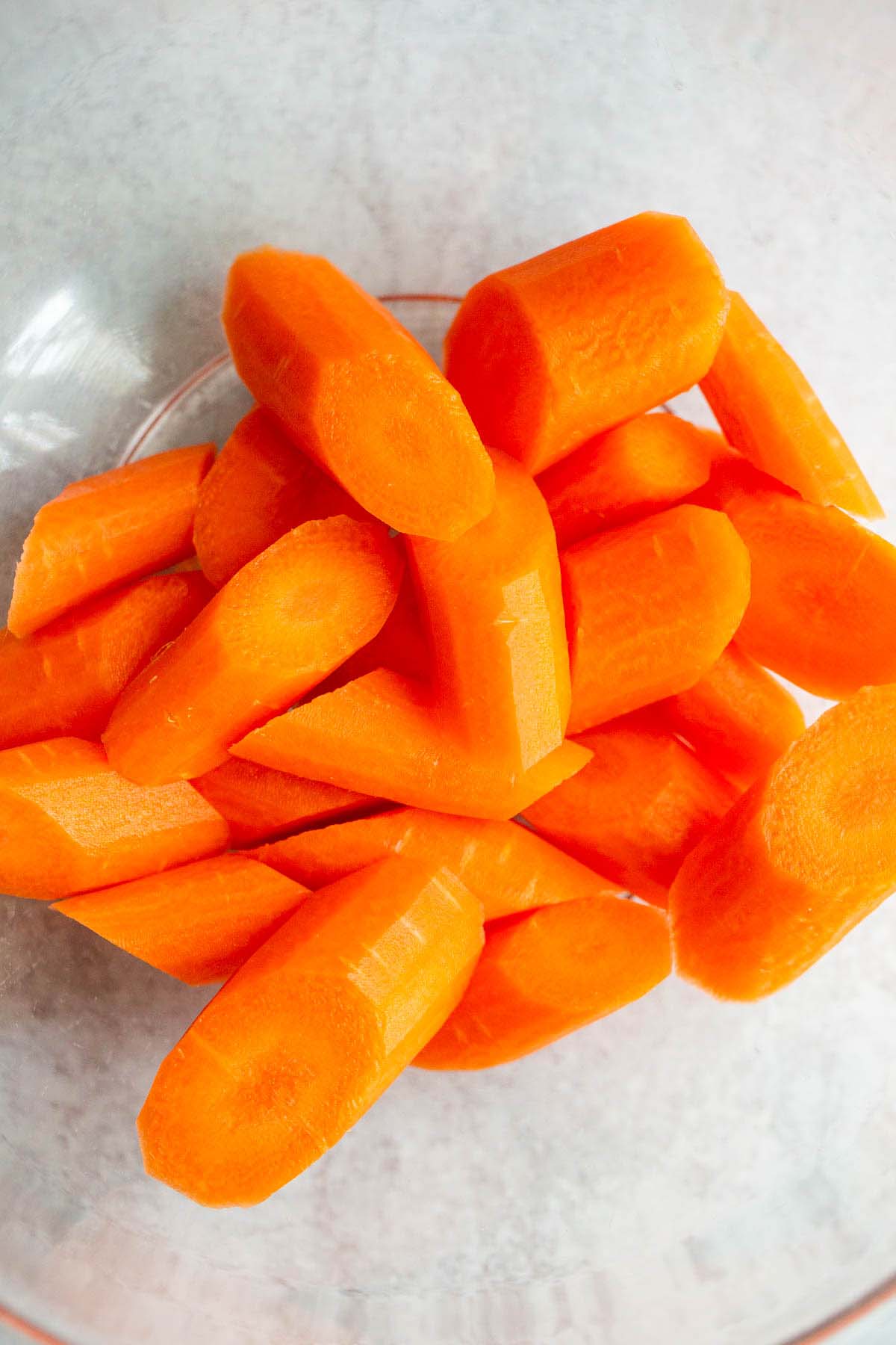 Raw sliced carrots in a bowl