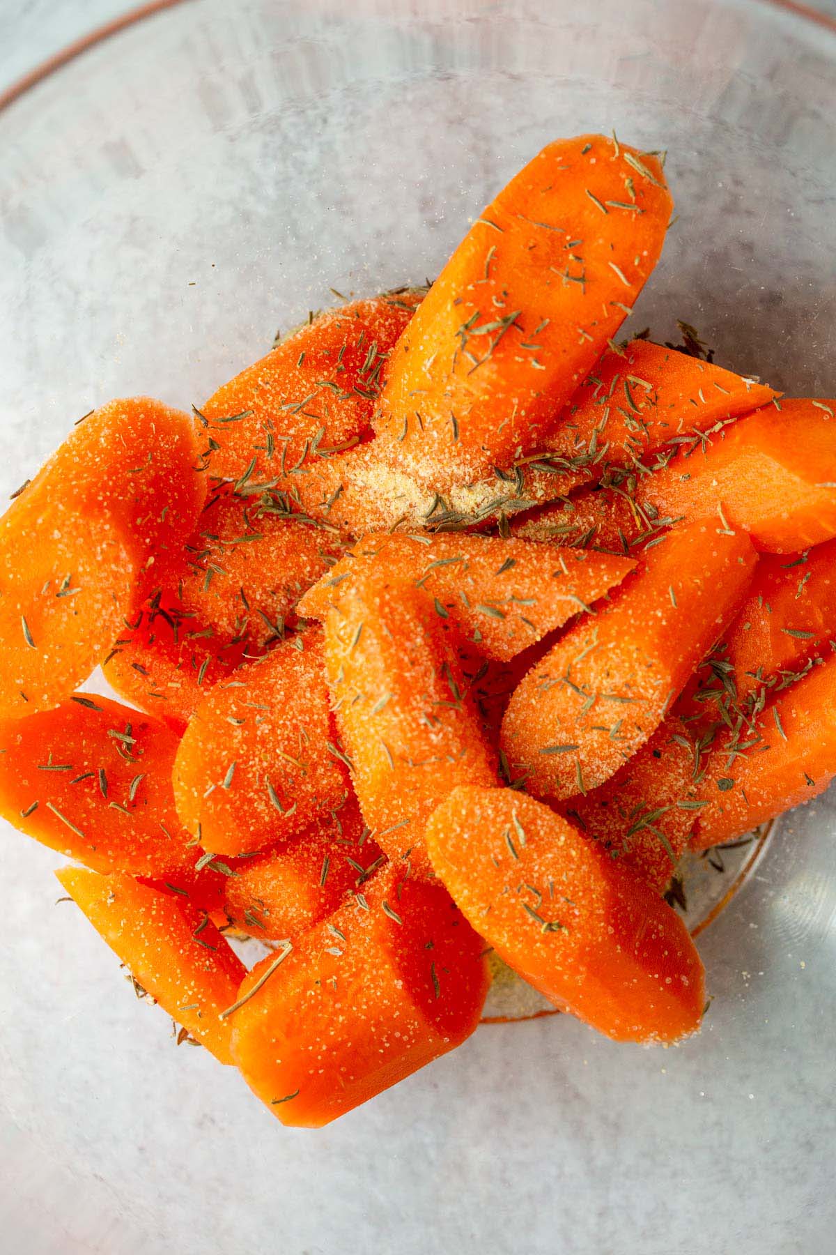 Carrots with seasonings in a bowl