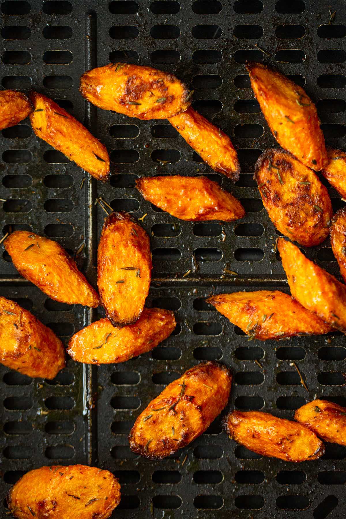 Air fried carrots in air fryer basket