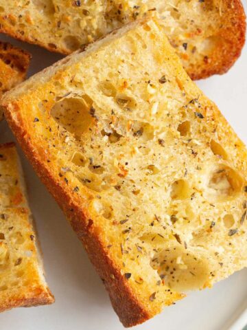 Air fryer garlic bread on a white plate