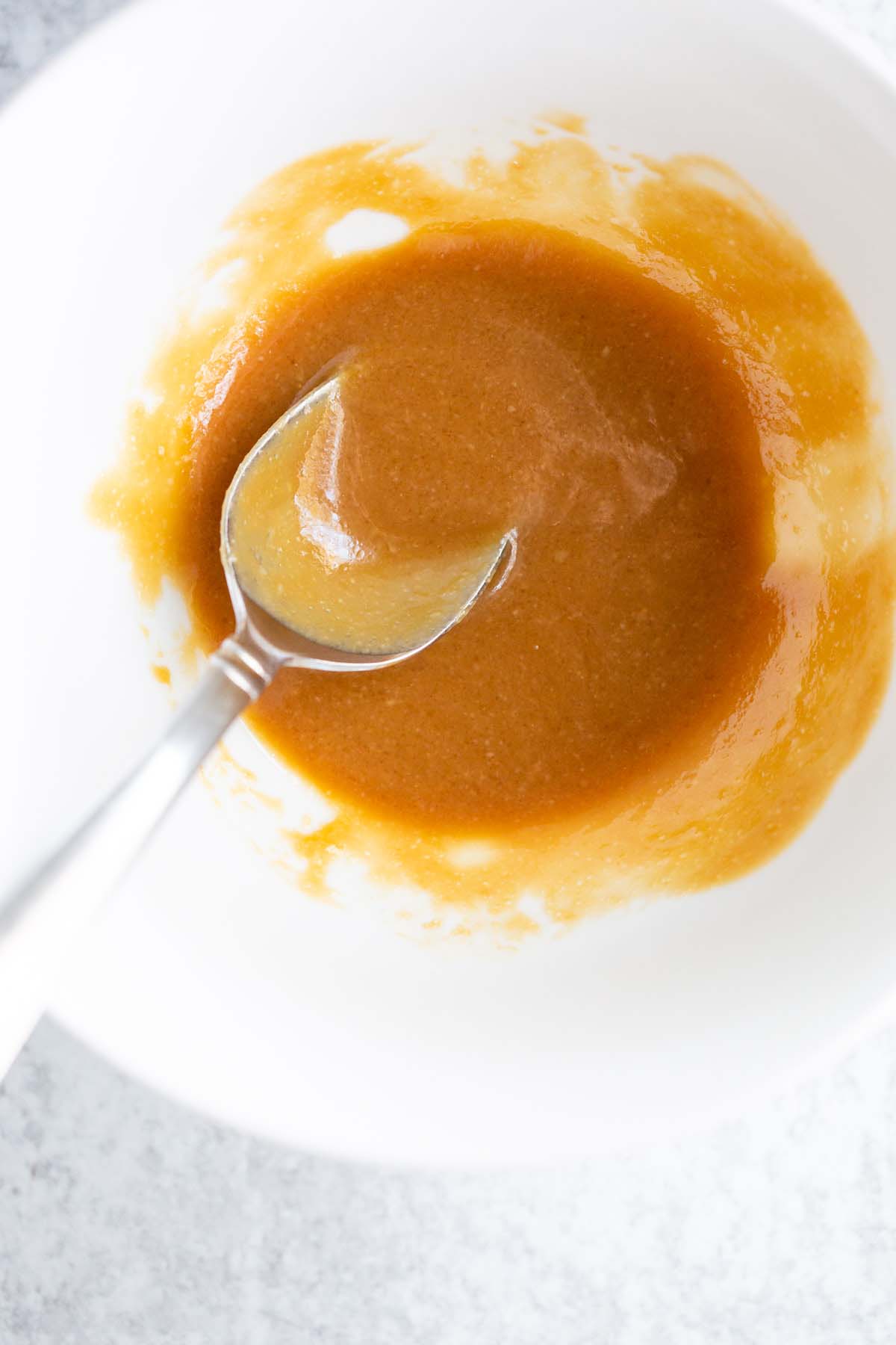 Miso glaze in a small white bowl