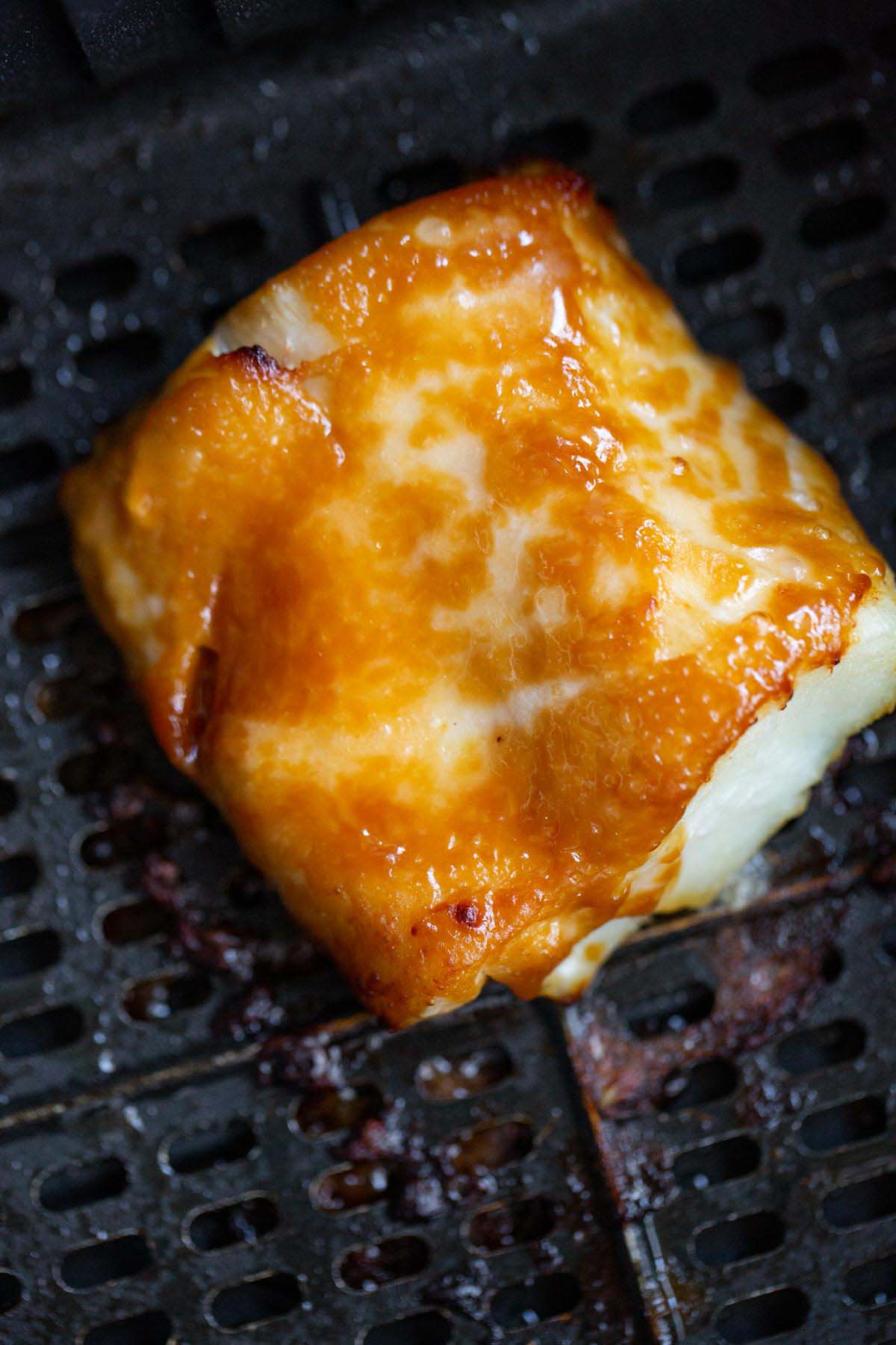 Cooked miso cod in air fryer basket