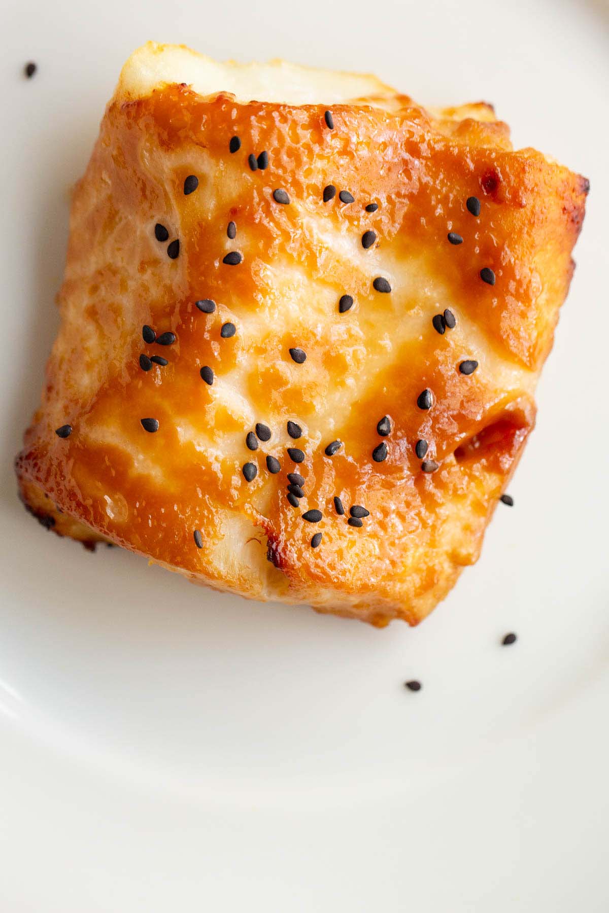 Air fryer miso cod up close topped with black sesame seeds