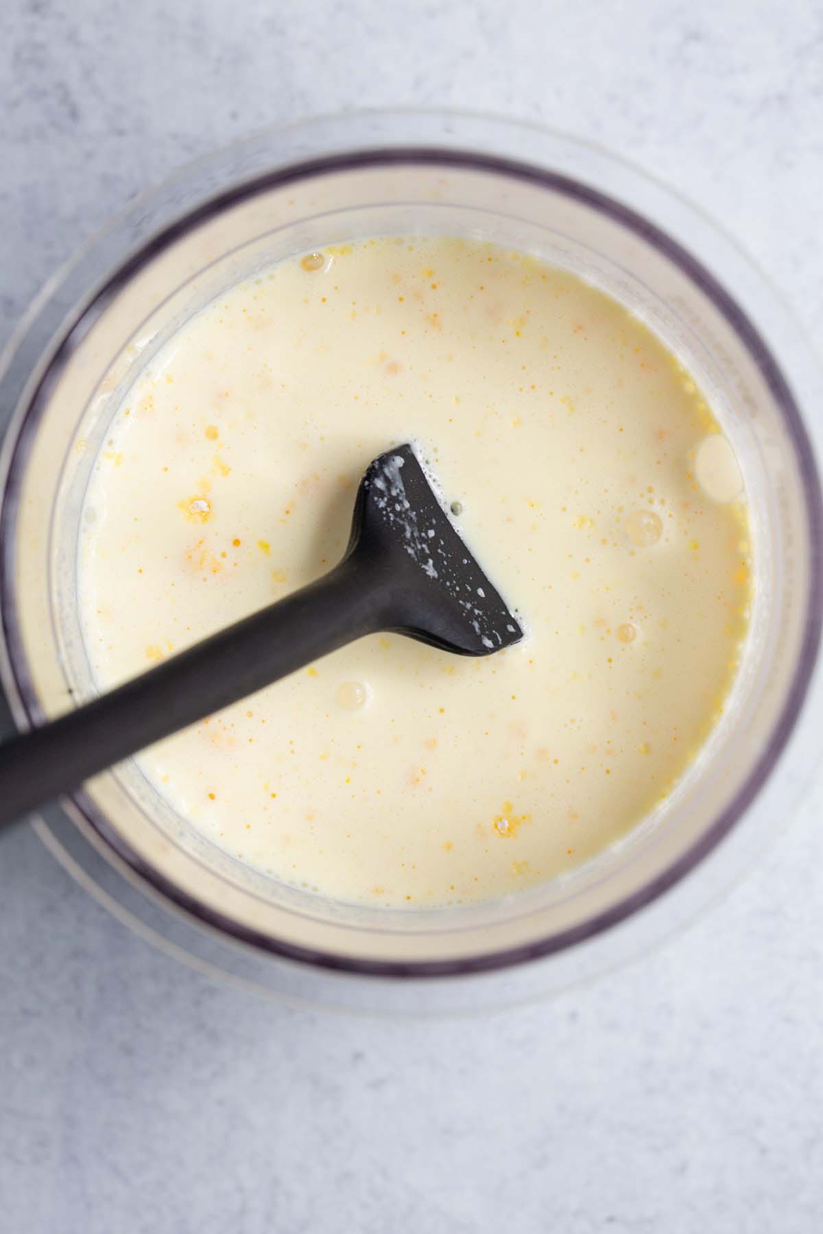 Mixing ingredients for cake batter ice cream