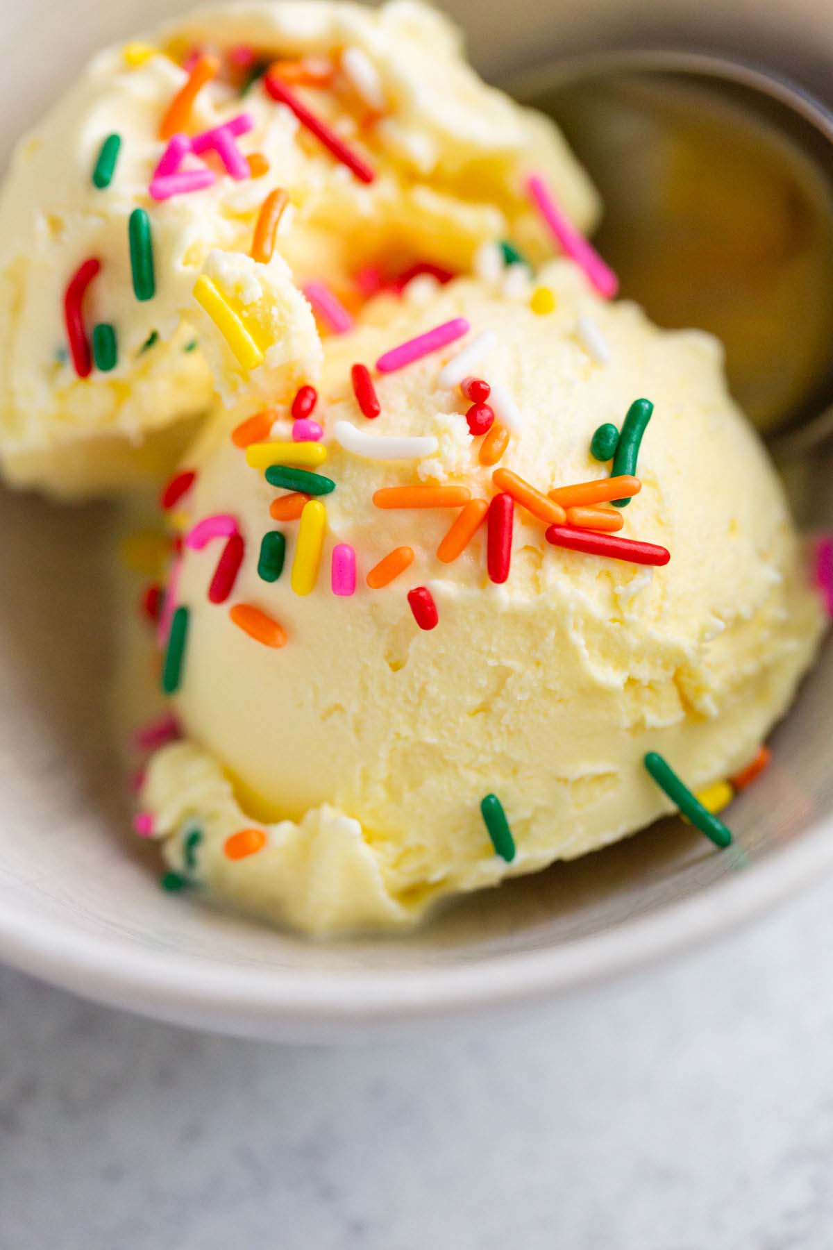 Creami cake batter ice cream topped with sprinkes