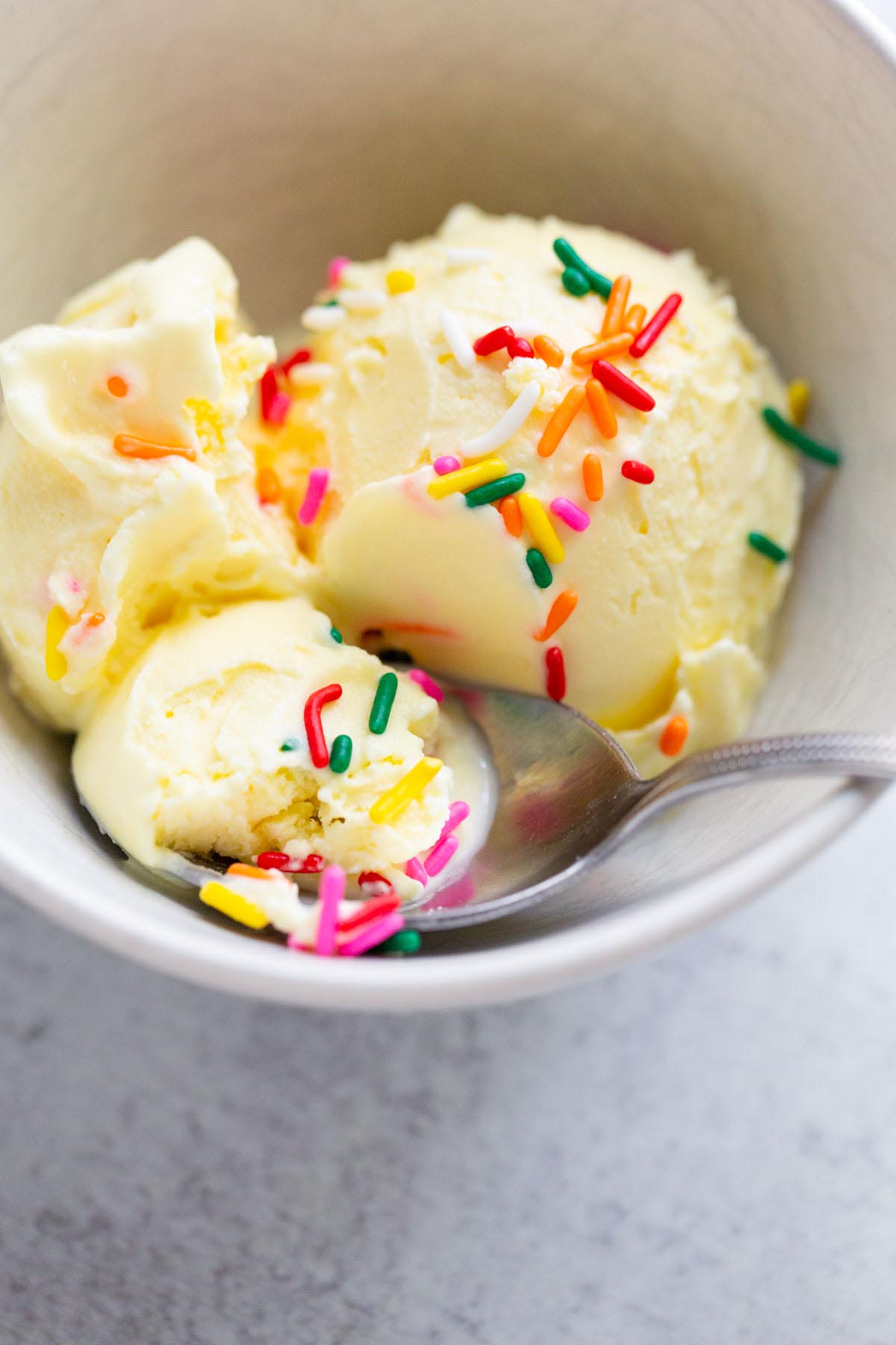 Creami cake batter ice cream topped with sprinkes