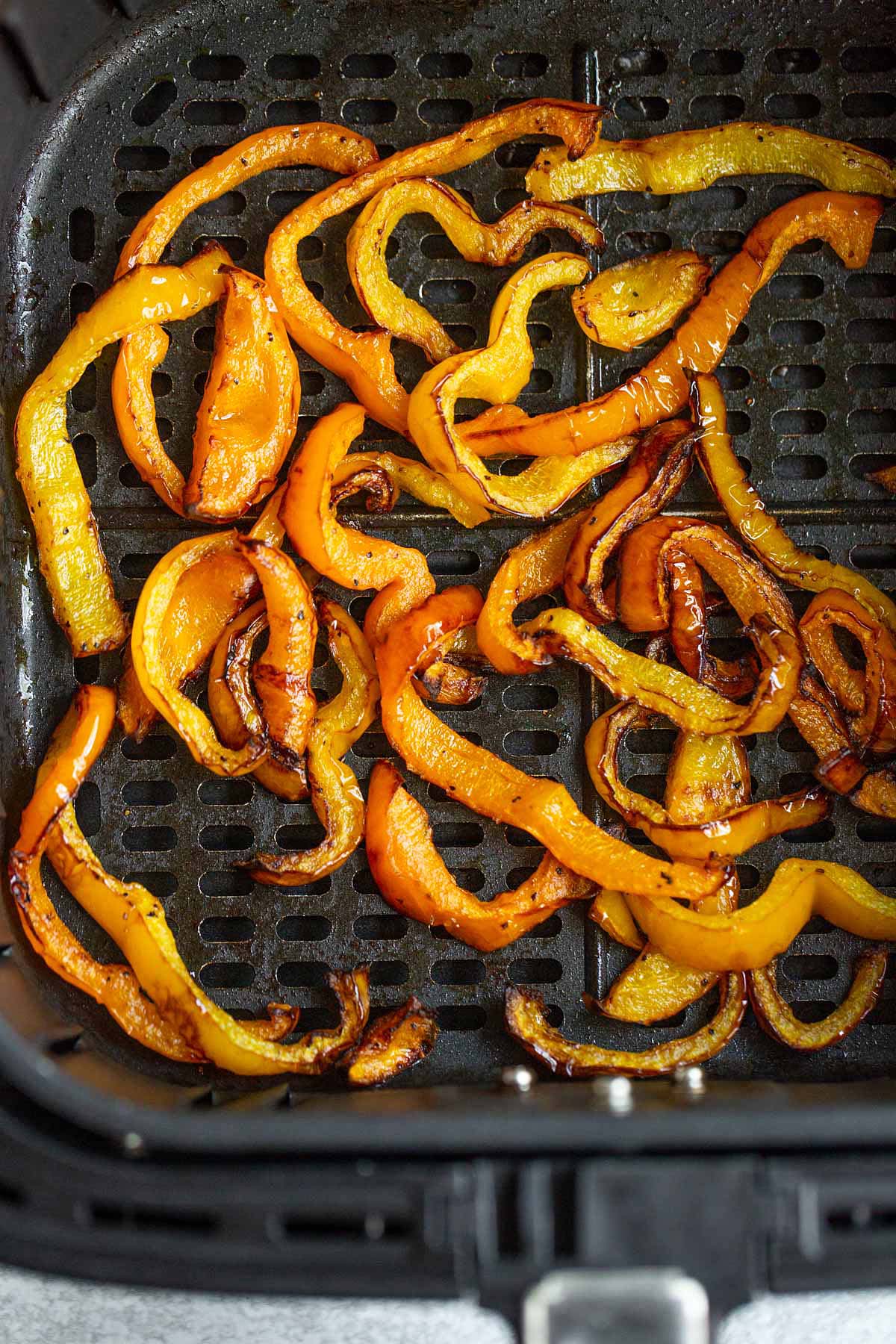 Air fried bell peppers in air fryer basket
