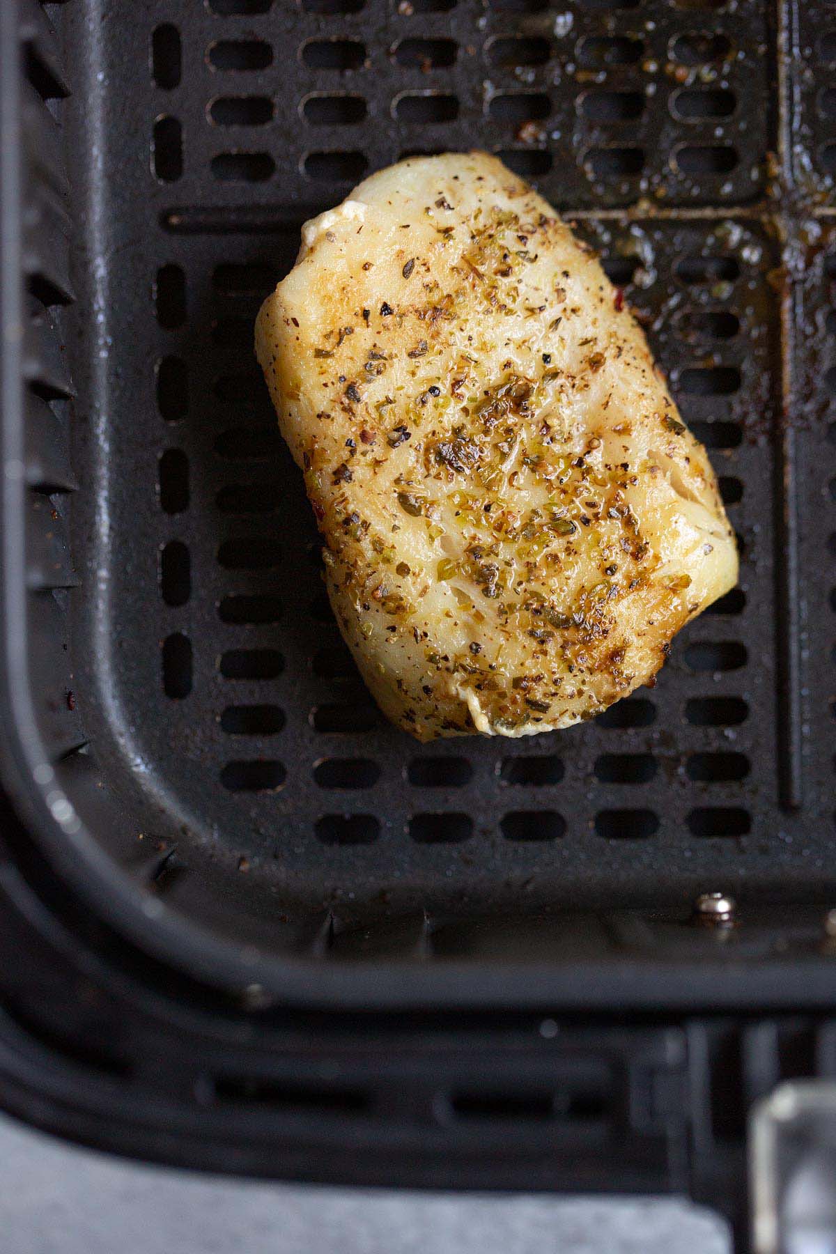 Cooked frozen cod in air fryer basket