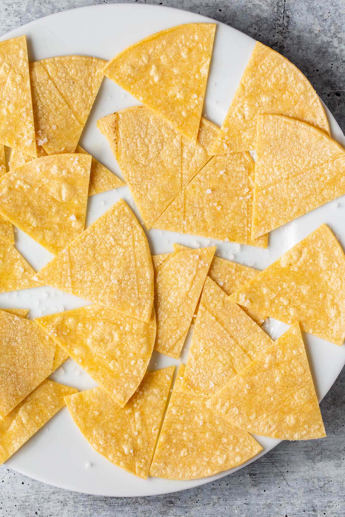 Tortilla triangles sprinkled with salt