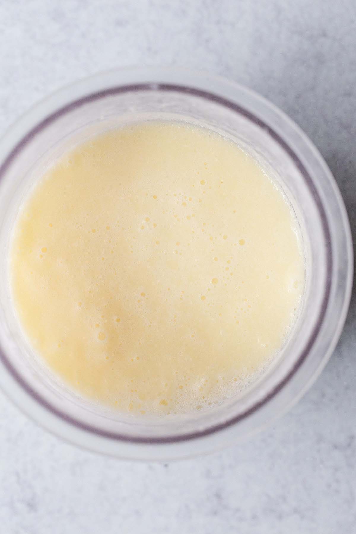 Frozen ice cream in creami container