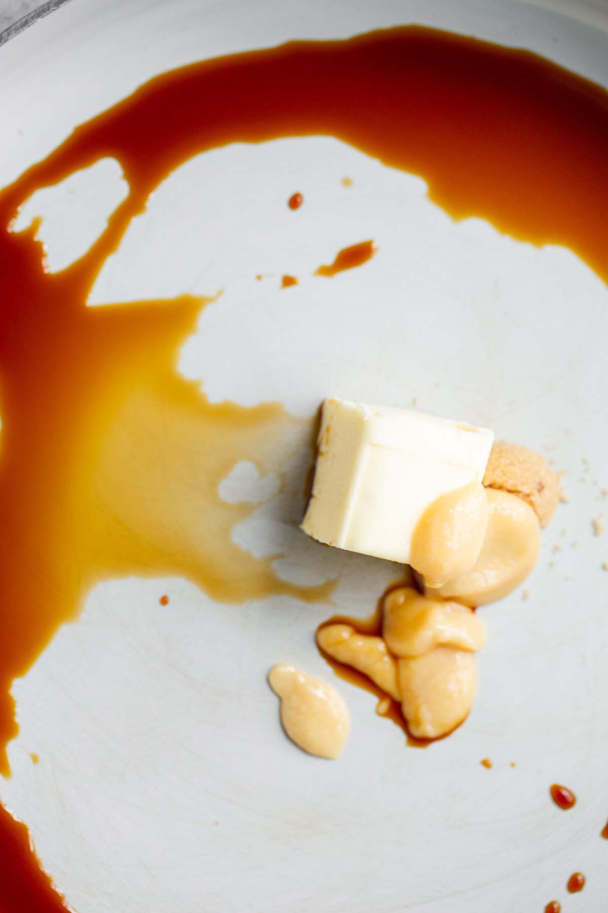 Ingredients for miso butter sauce in a skillet