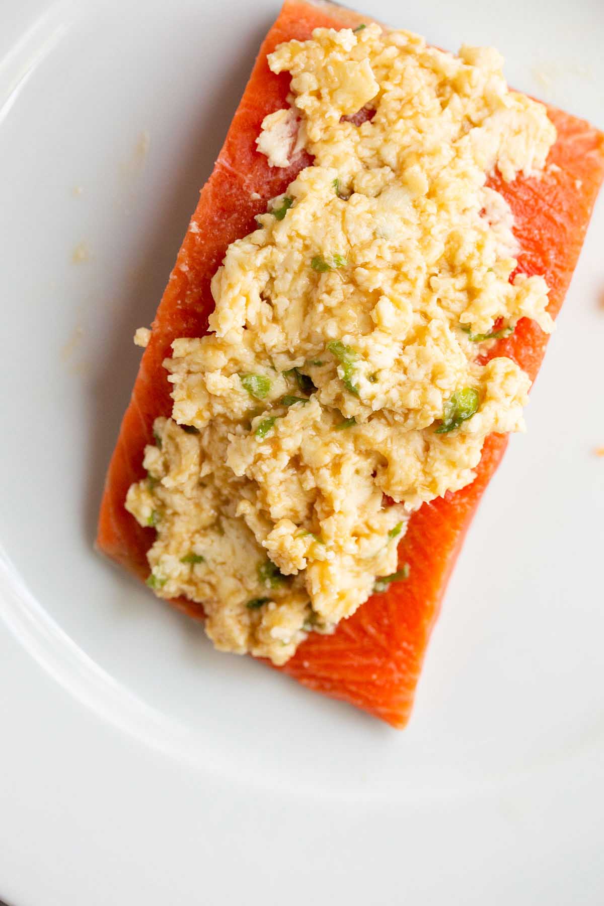 Uncooked salmon topped with miso butter