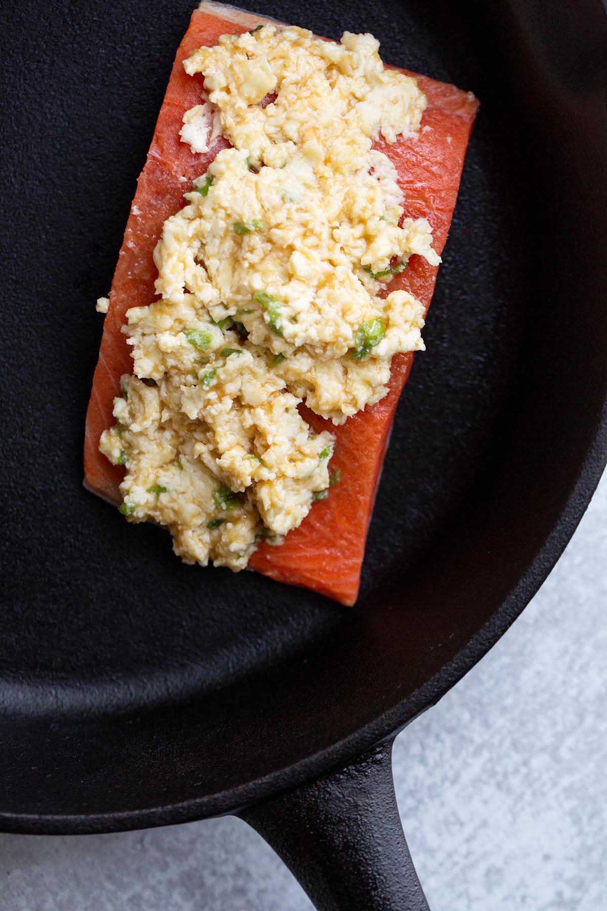 Uncooked salmon topped with miso butter