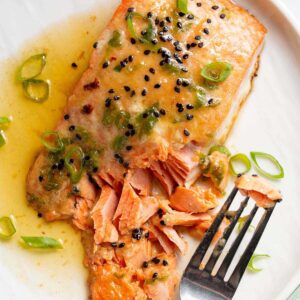 Miso butter salmon flaked with a fork