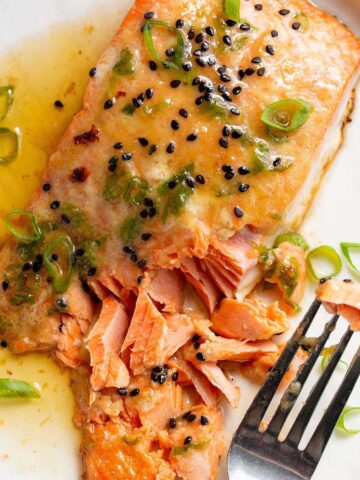 Miso butter salmon flaked with a fork