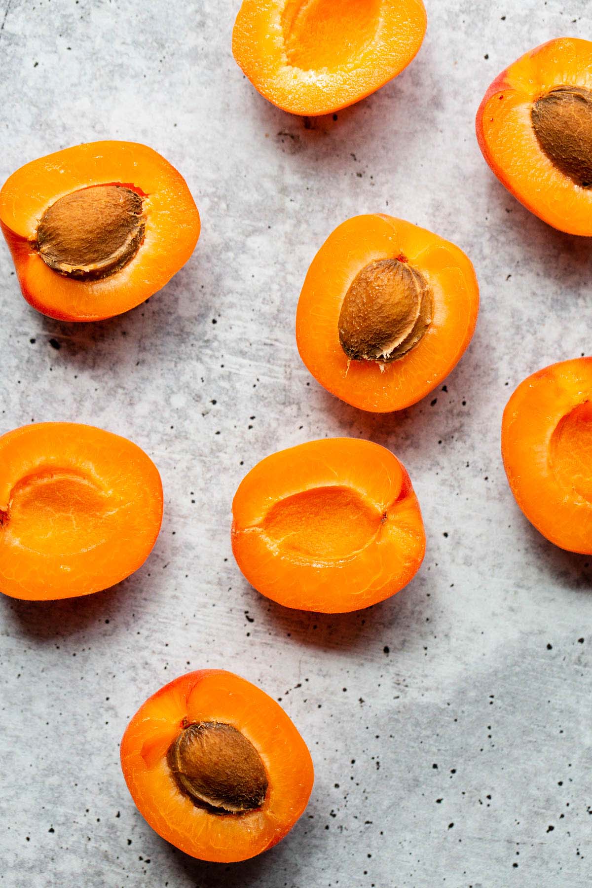 Apricots cut in half.