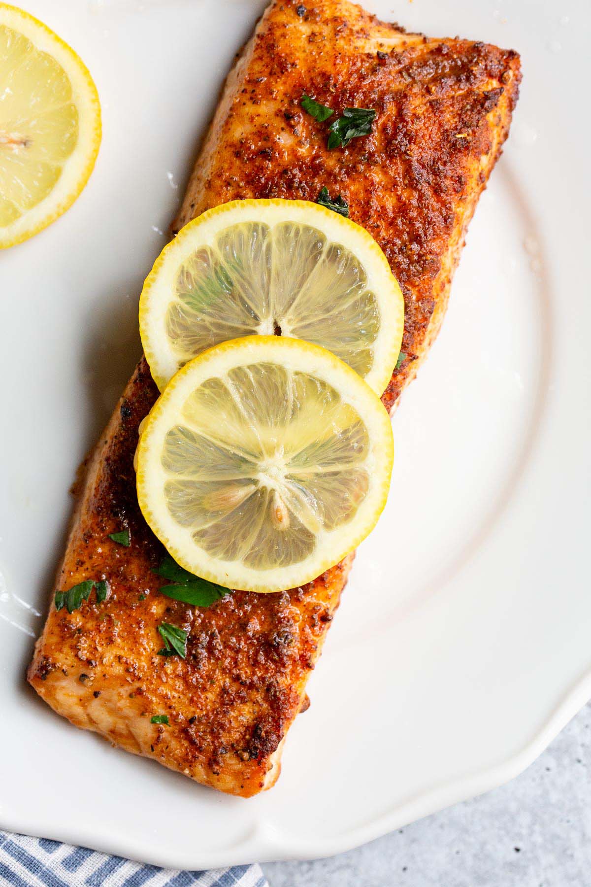 Air fryer old bay salmon with lemon slices