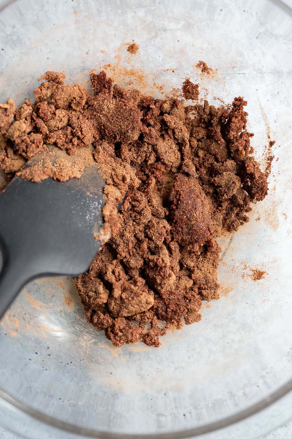 Mixing together chocolate ice cream ingredients