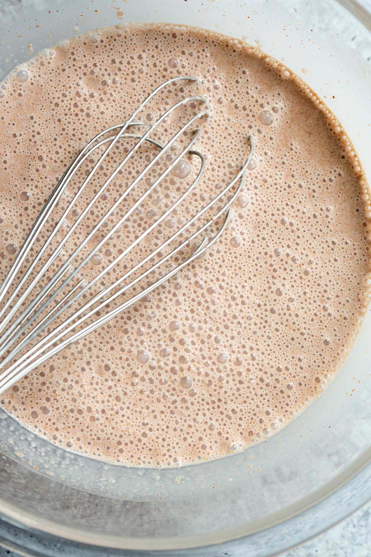 Whisking chocolate ice cream base