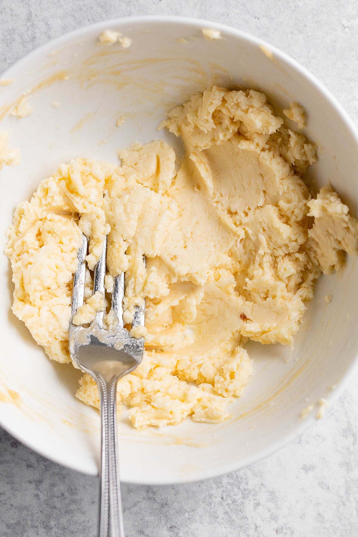 Combining ingredients to make miso butter