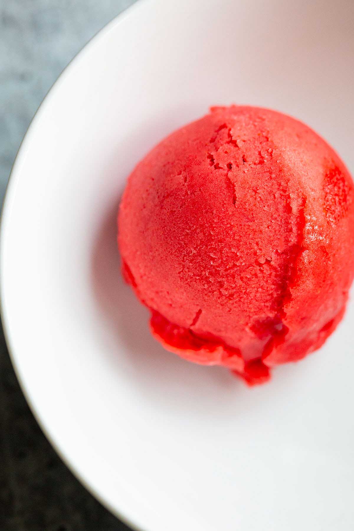 A scoop of Ninja Creami strawberry sorbet