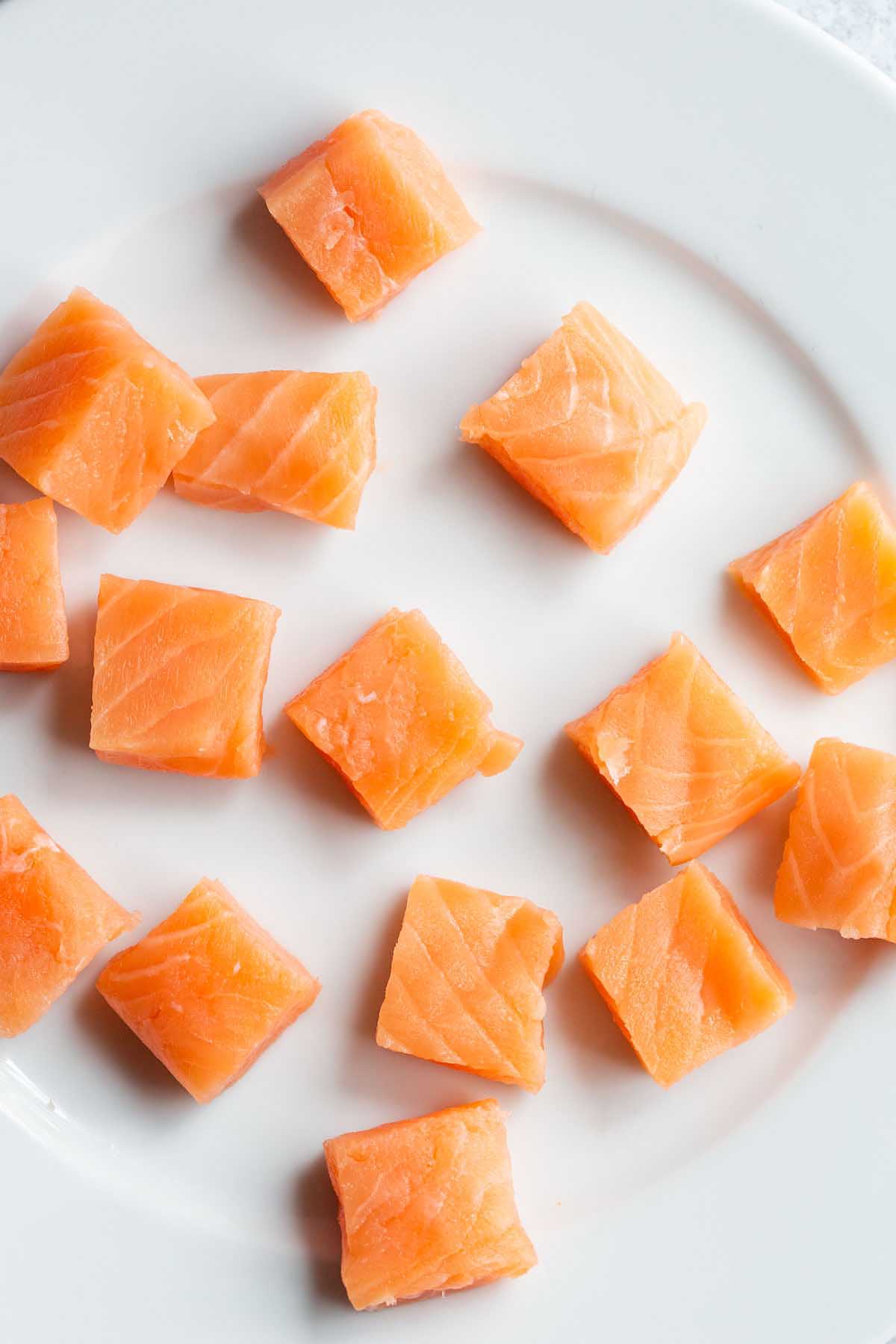 Raw salmon cut into cubes