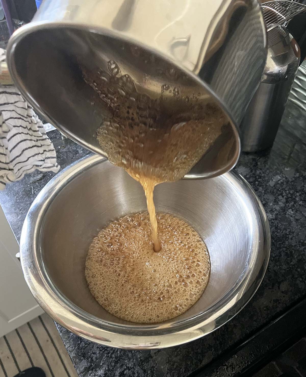 Pouring honeycomb mixture in a bowl