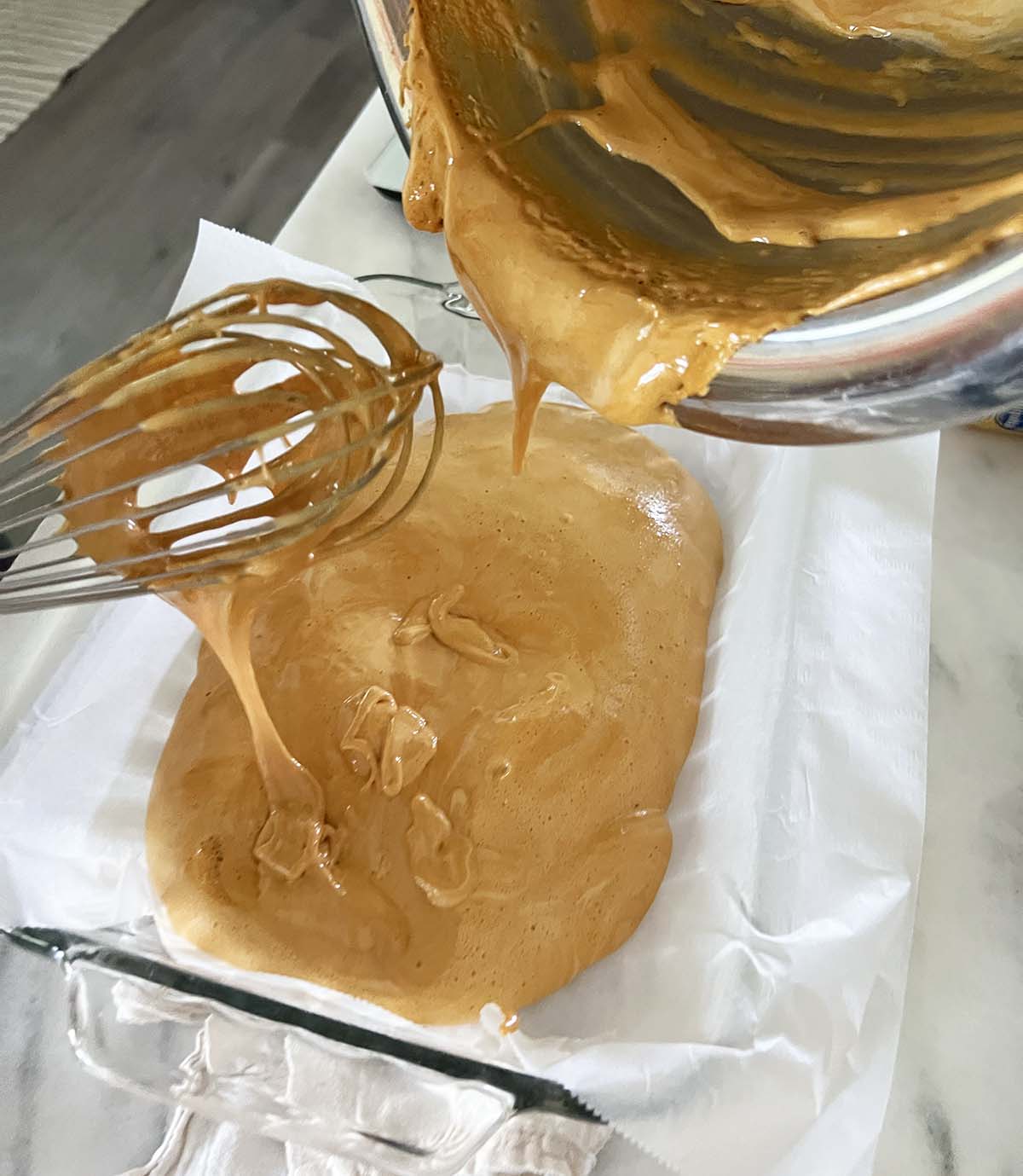 Pouring honeycomb into prepared pan