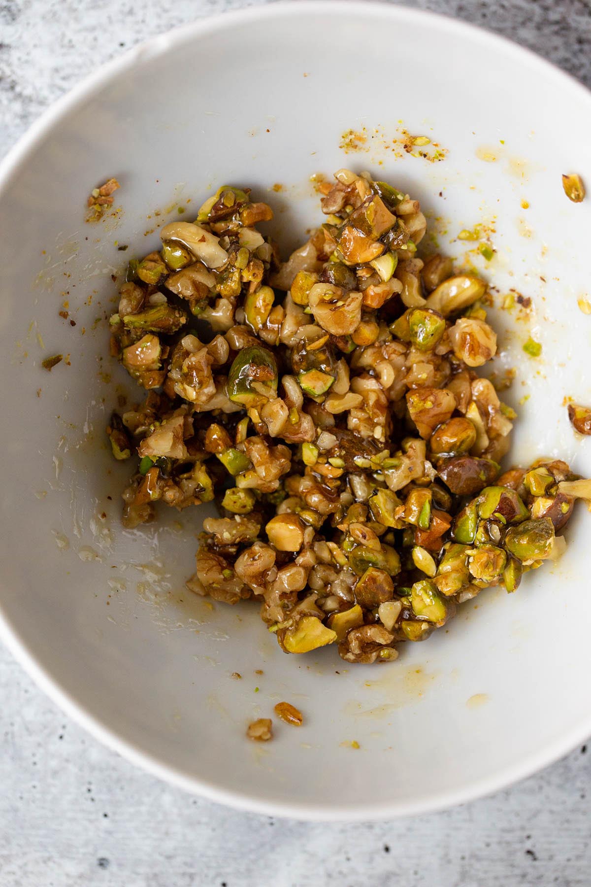 Walnnuts and pistachios mixed with honey