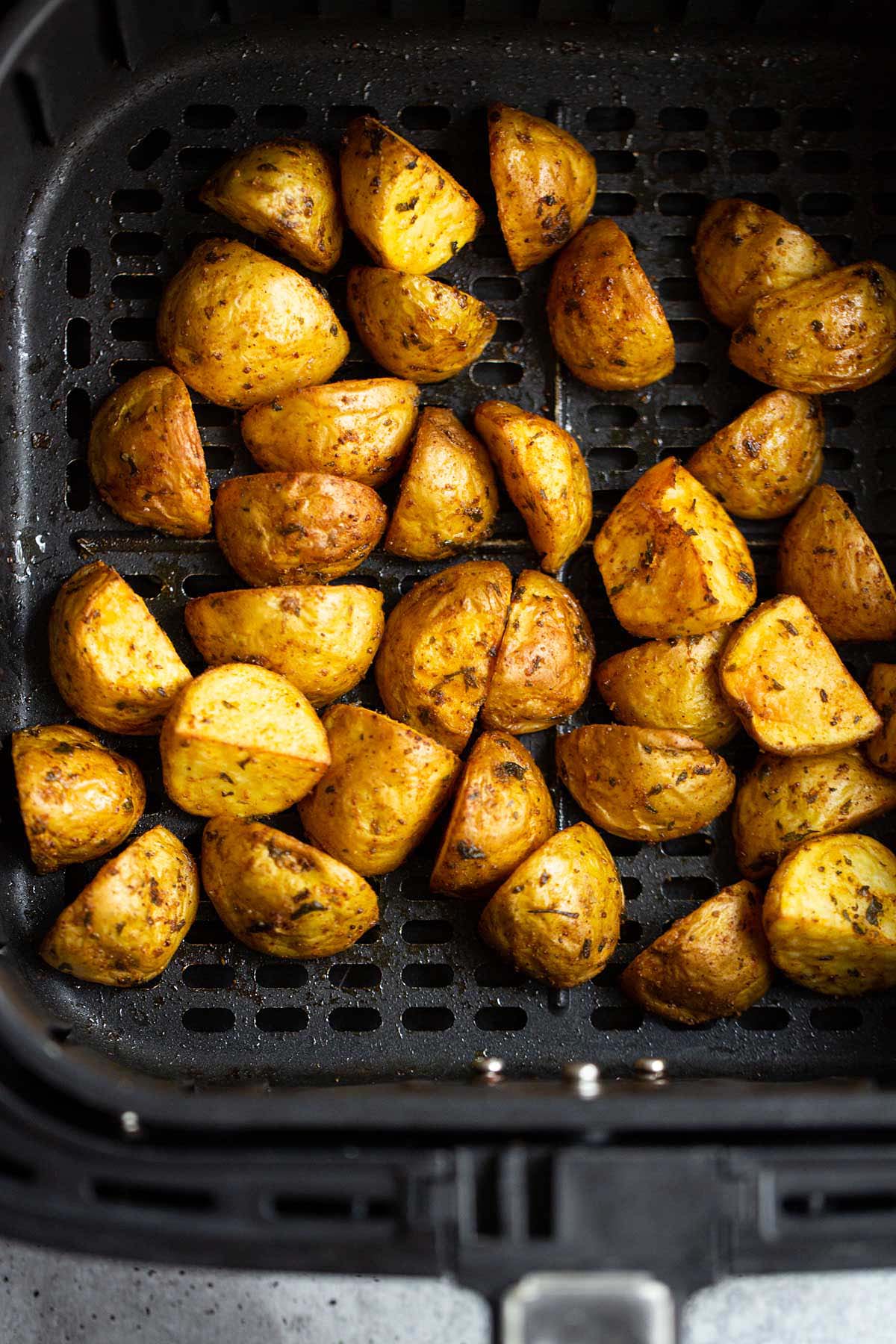 Air fryer old bay potatoes in air fryer basket