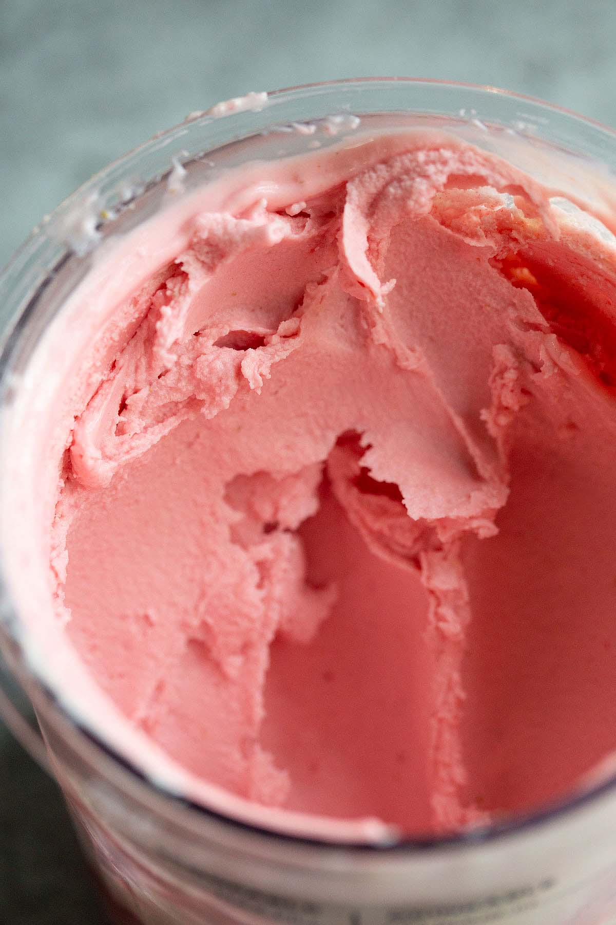 Ninja Creami Strawberry Frozen Yogurt in creami pint