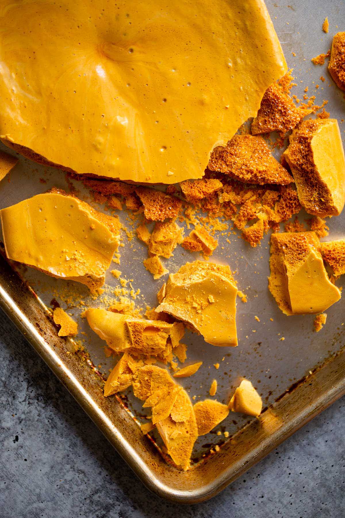 Homemade honeycomb candy on a baking sheet