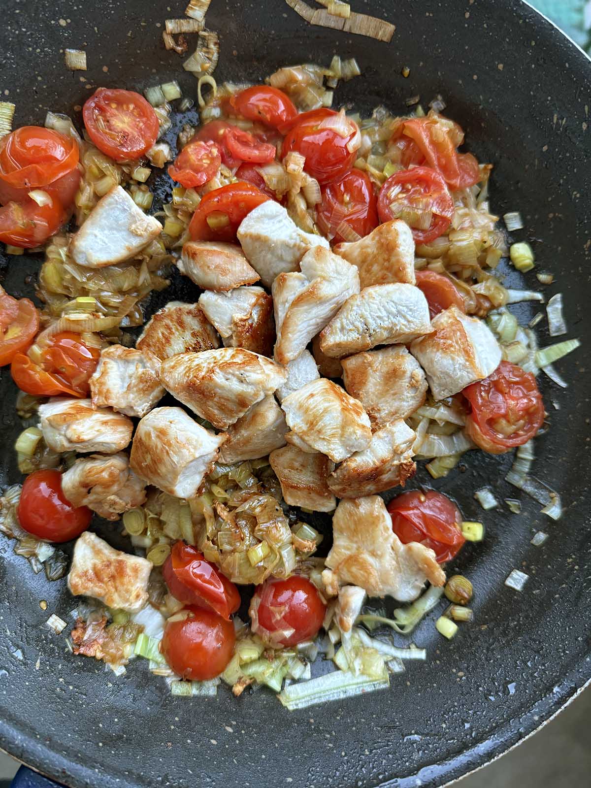 Adding pasta to skillet