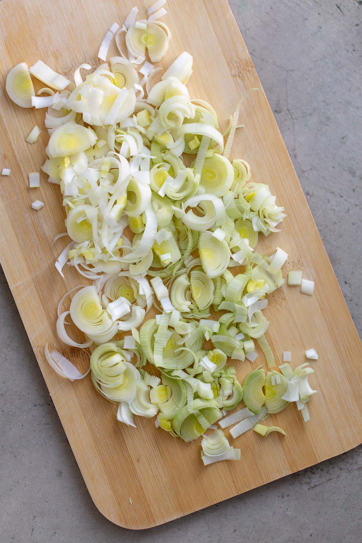 Sliced leeks on a cutting board