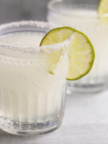 Ninja Creami frozen margarita with lime wheels
