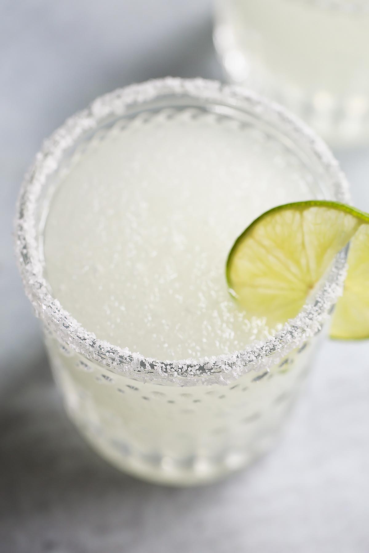 Ninja Creami frozen margarita with lime wheels