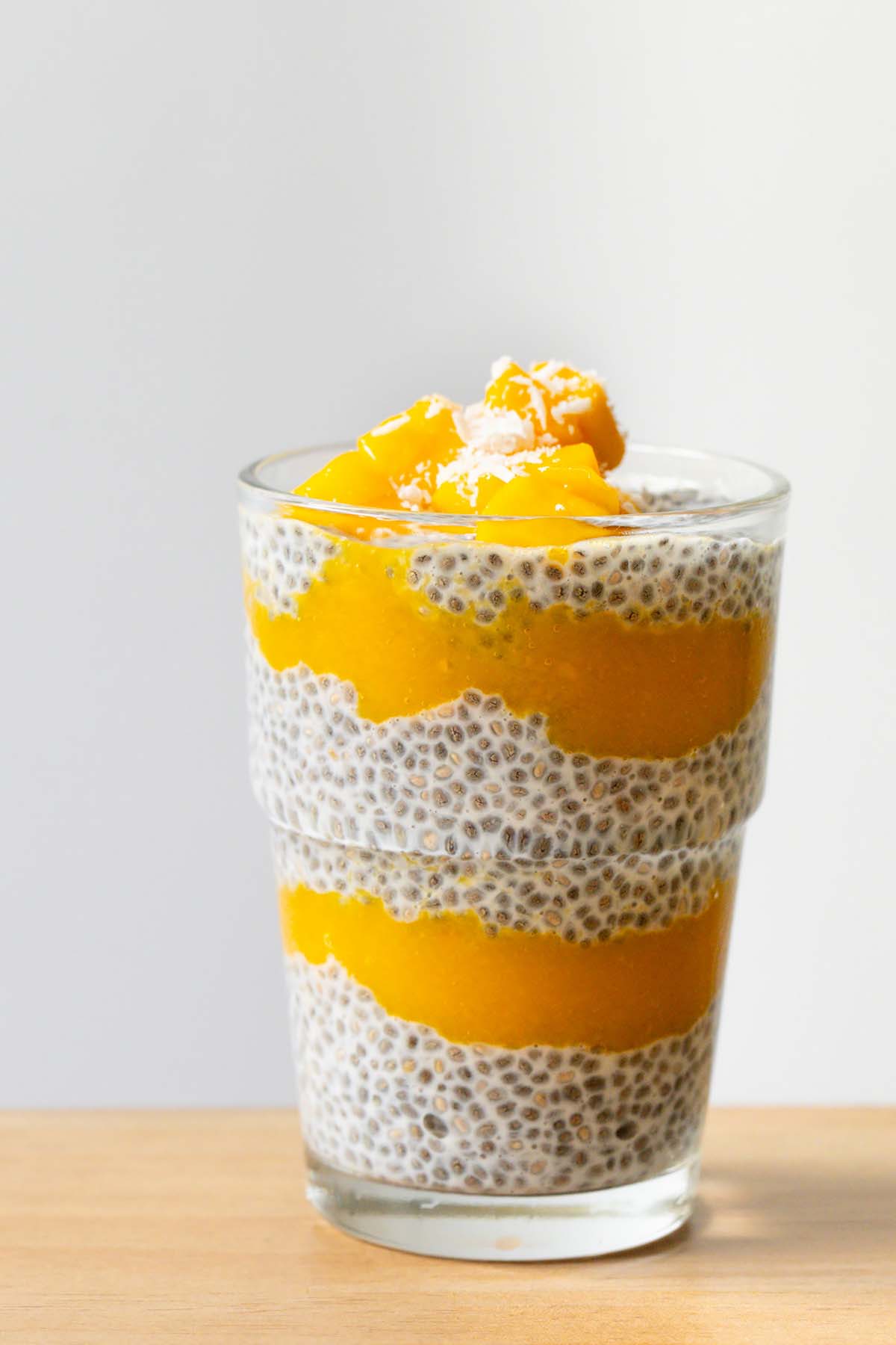 Mango chia pudding topped with mango and coconut