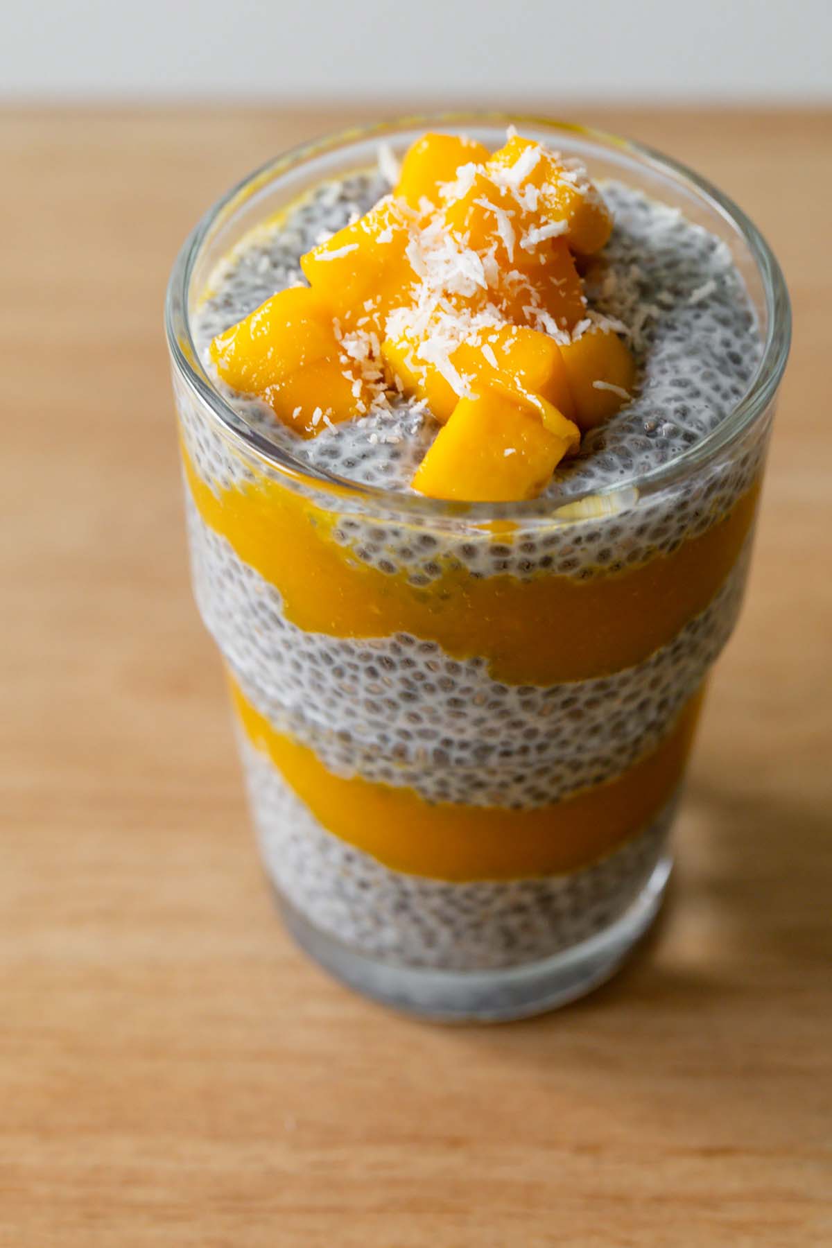Mango chia pudding topped with mango and coconut