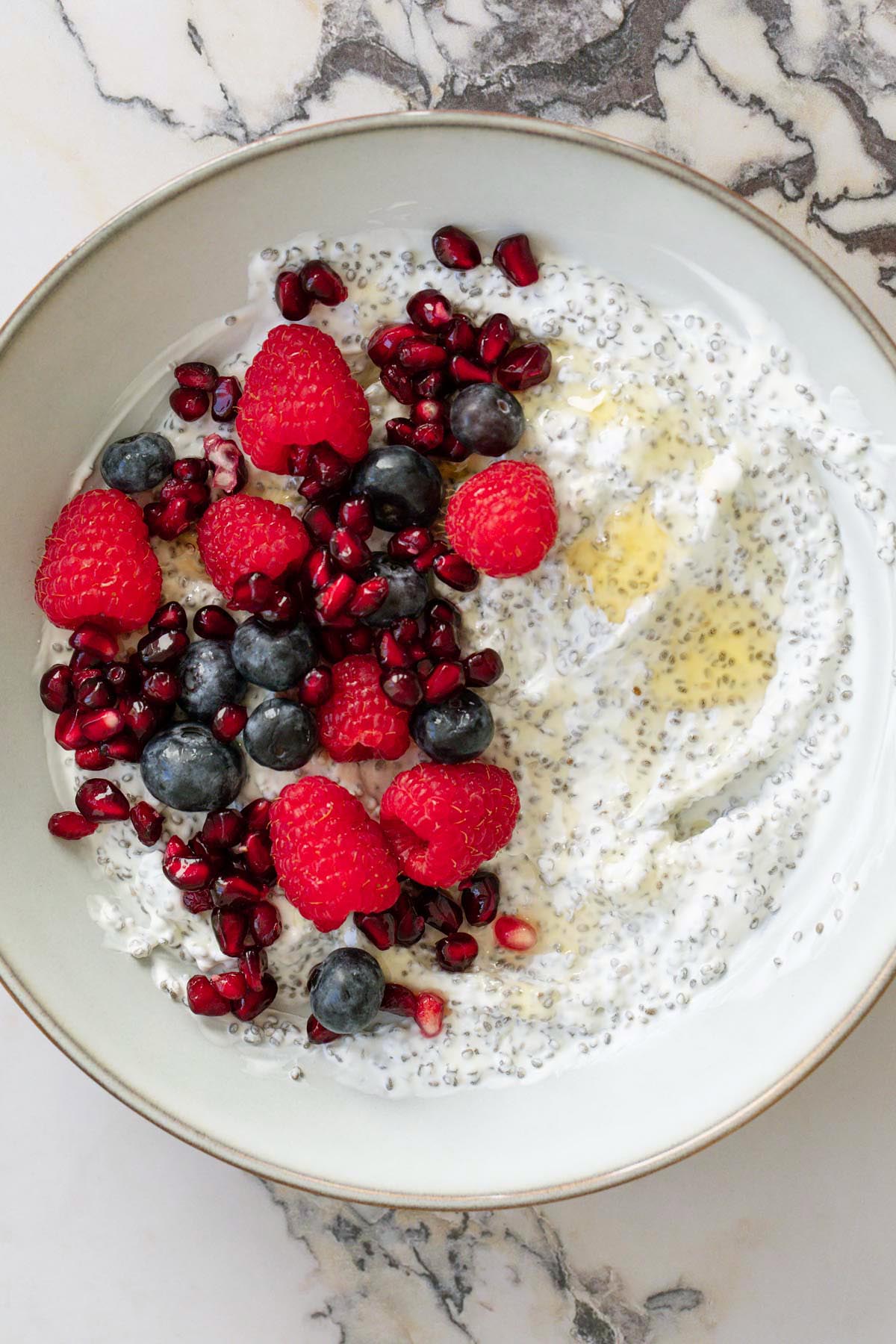 Yogurt chia pudding topped with fresh berries