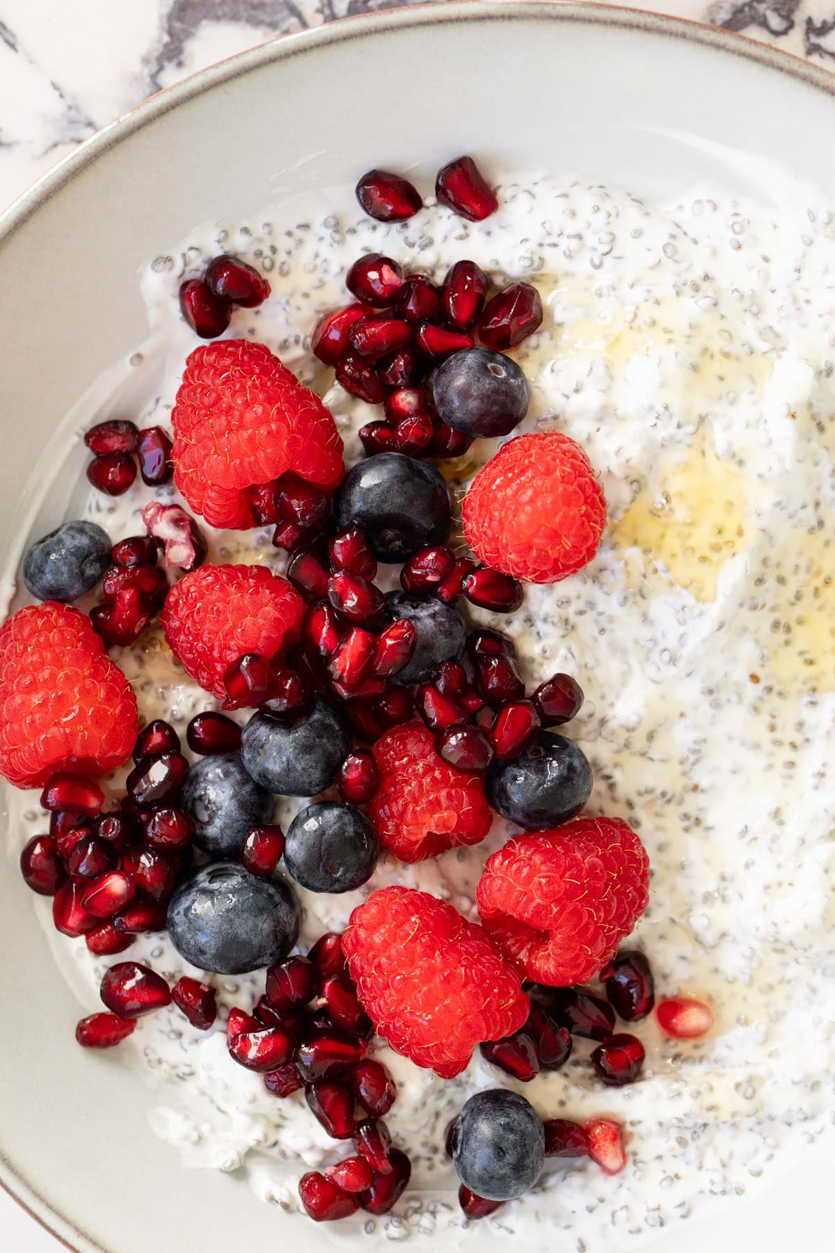 Protein-rich yogurt chia pudding topped with fresh berries