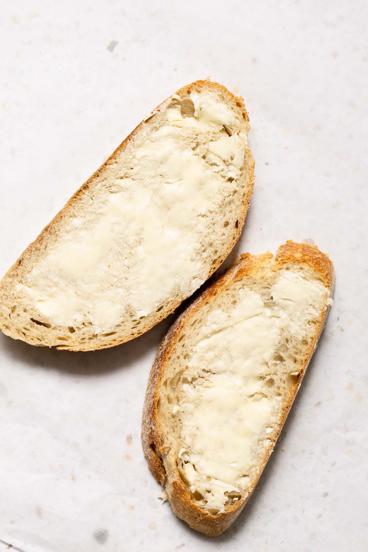 Buttered slices of bread