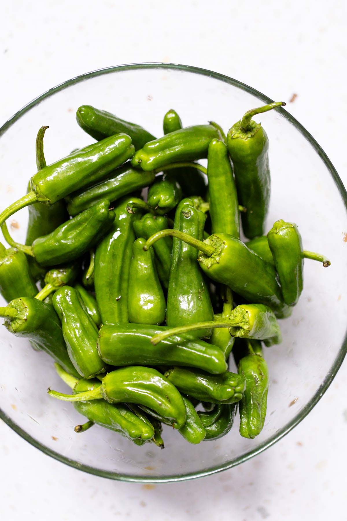 Padron peppers in glass bowl