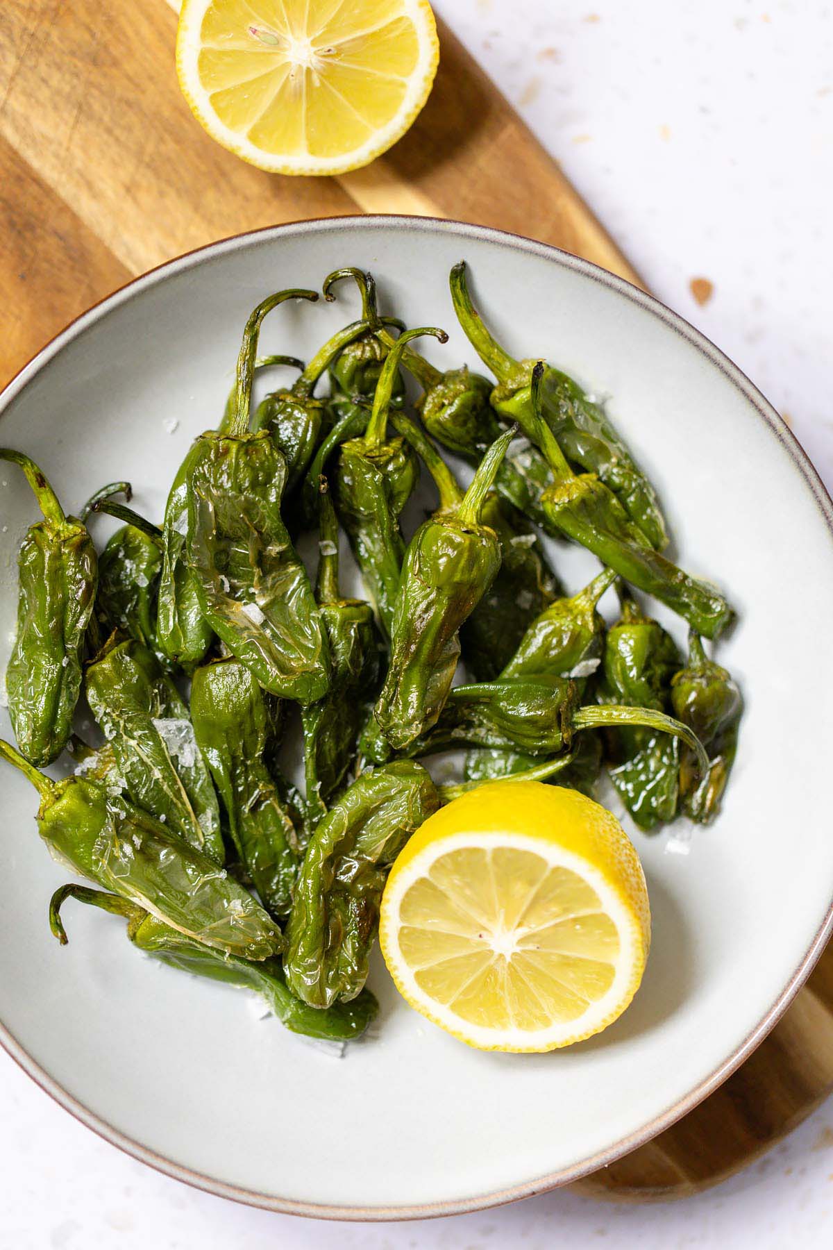Air fryer padron peppers with lemon