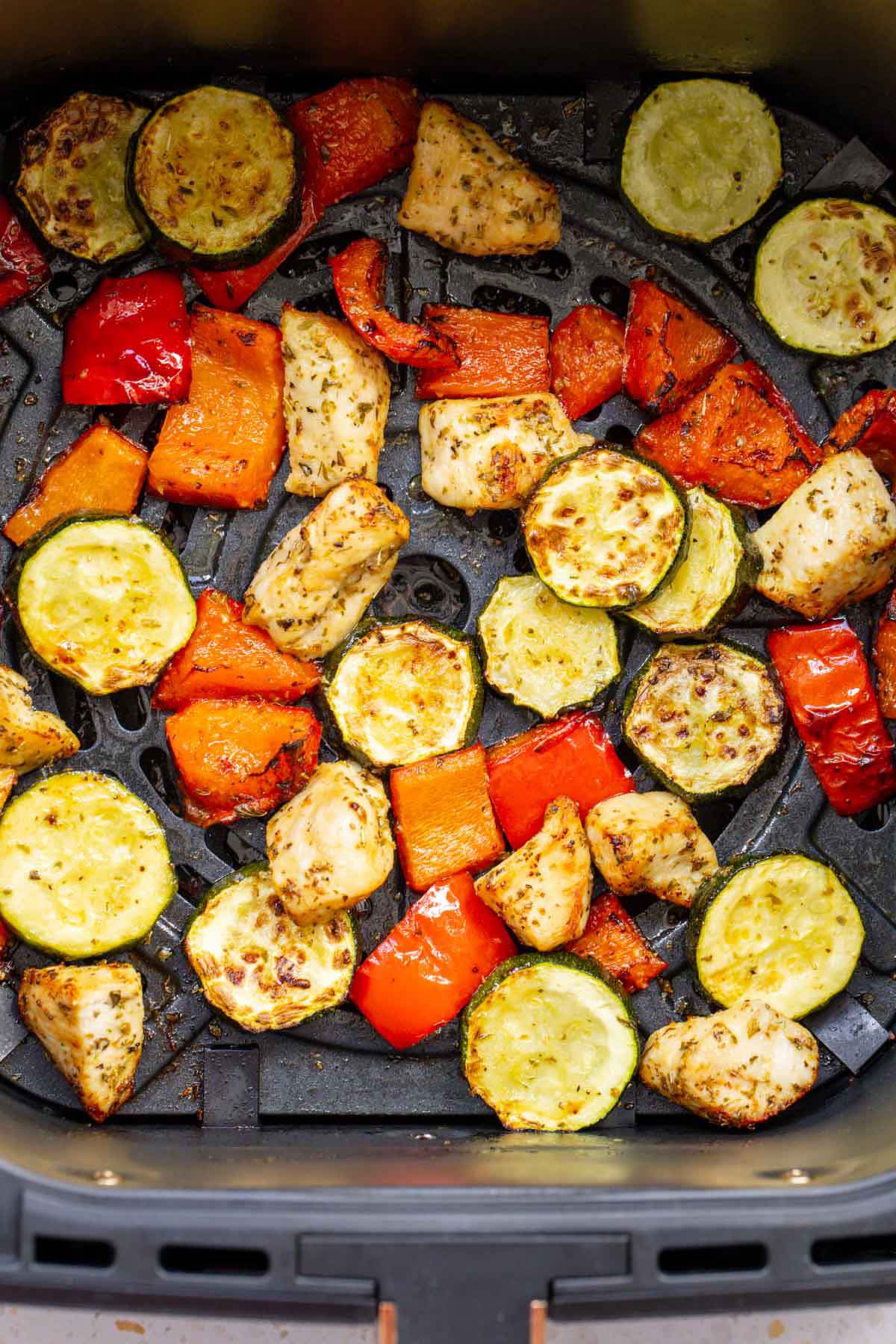 Air fryer chicken and vegetables in air fryer