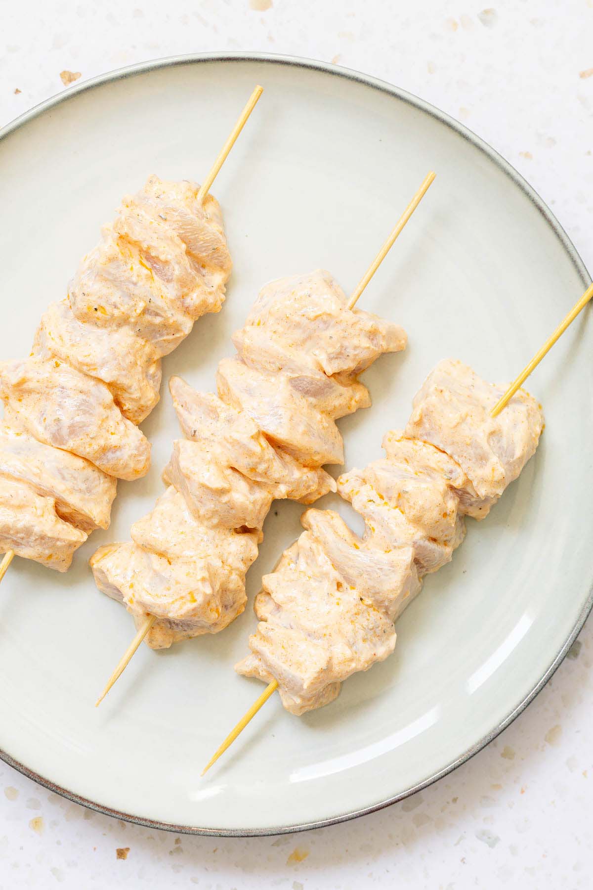 Assembling chicken skewers