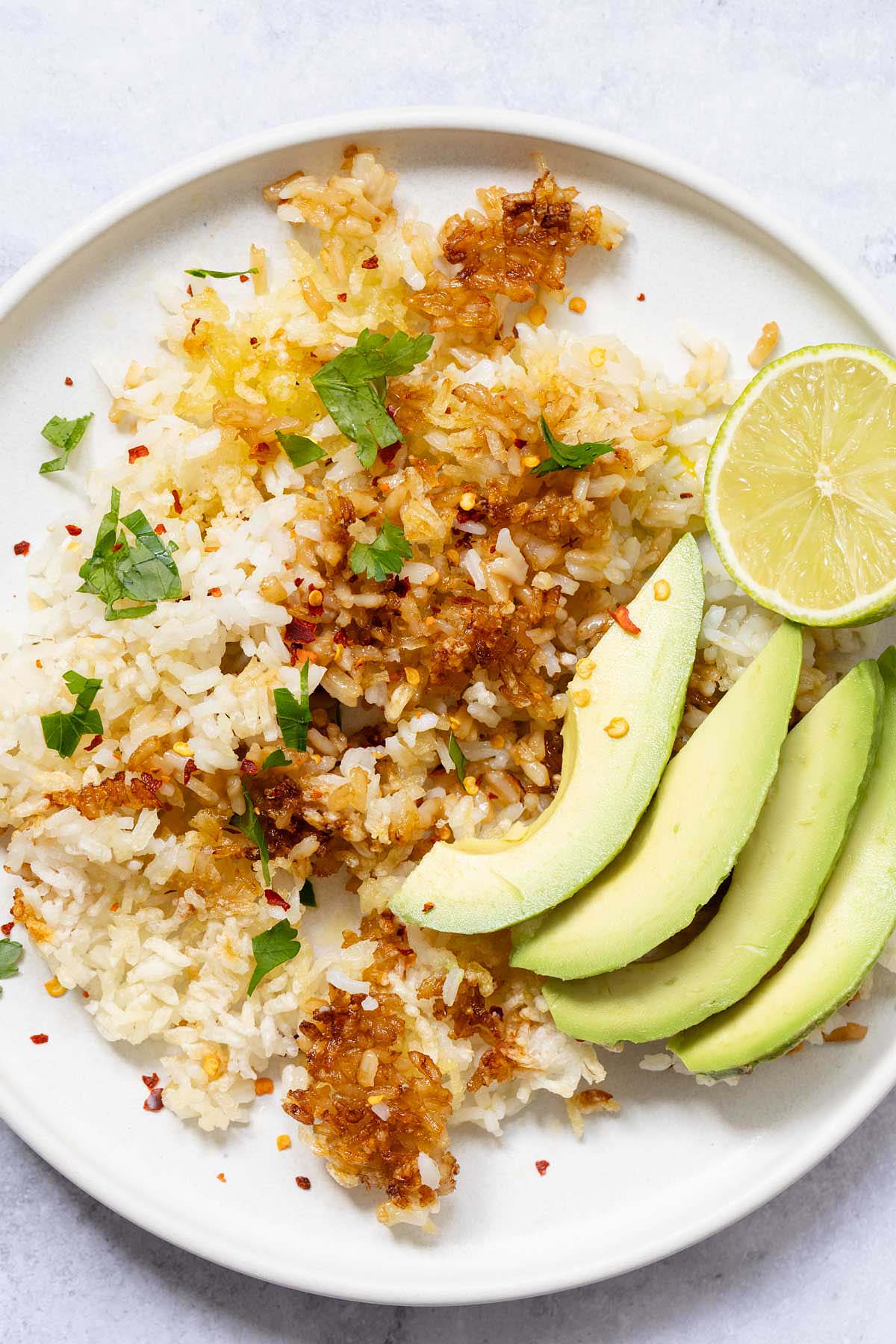 Air fryer crispy rice bowl with avocado and lime