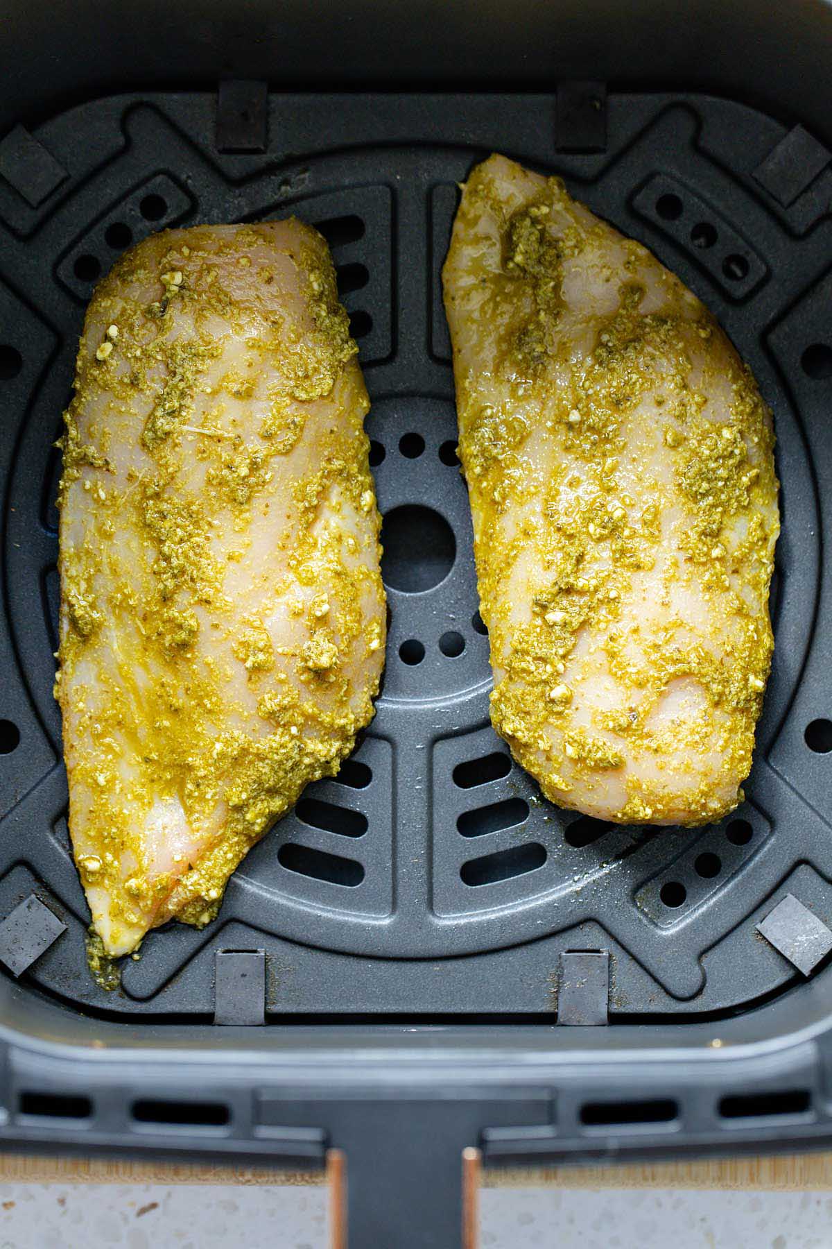 Uncooked chicken in air fryer