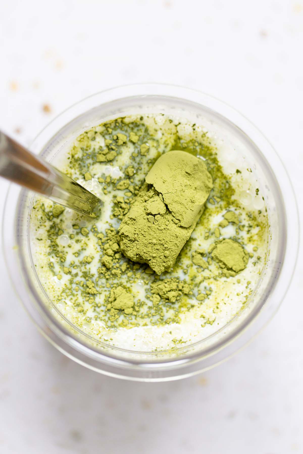 Adding matcha powder to Creami container