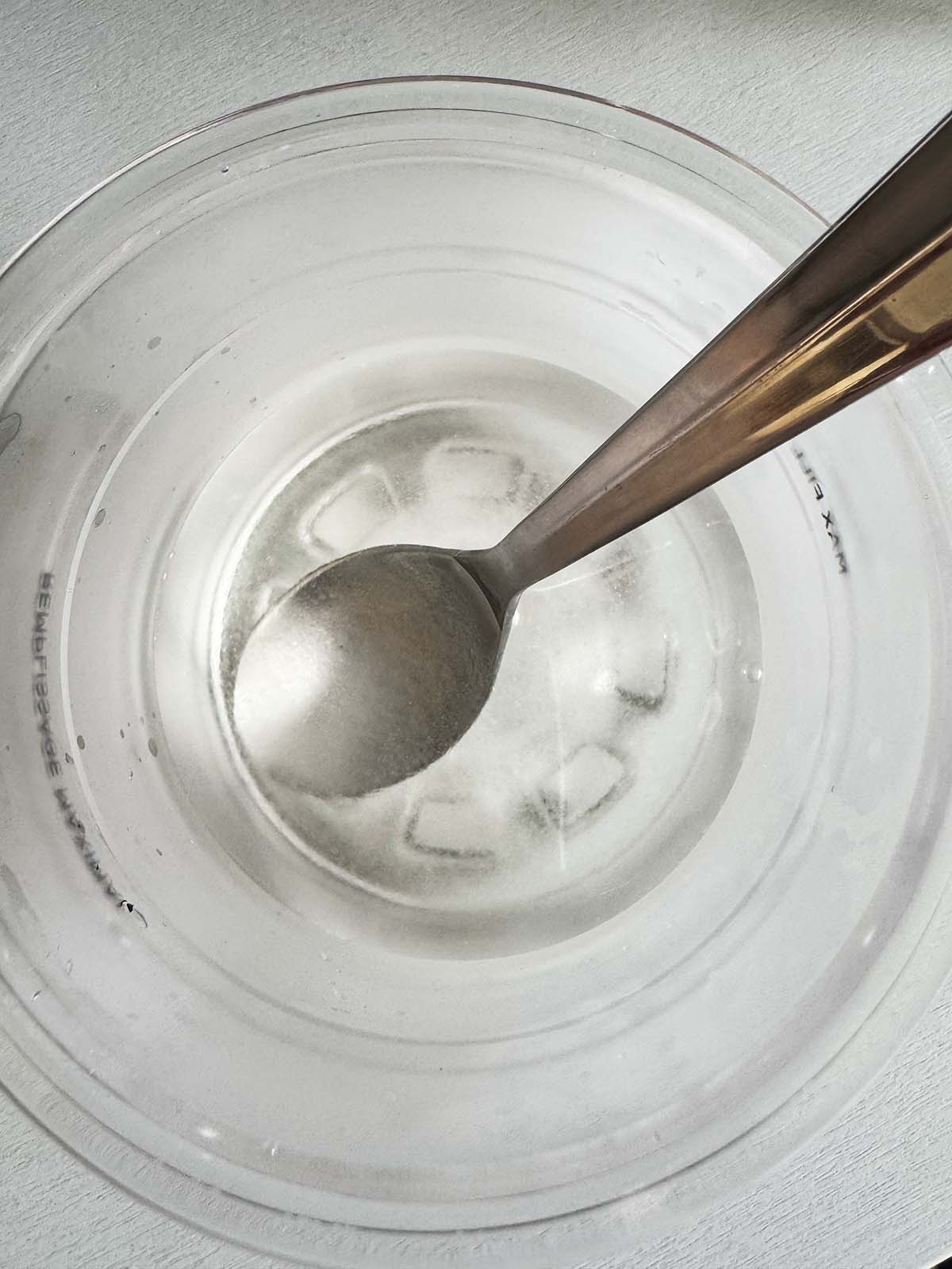 adding sugar and water together